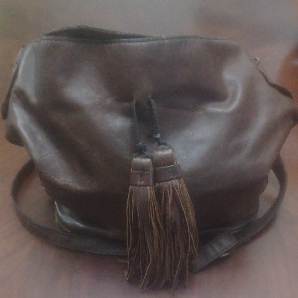 Elegant Brown Leather Hobo Bag with Tassels
